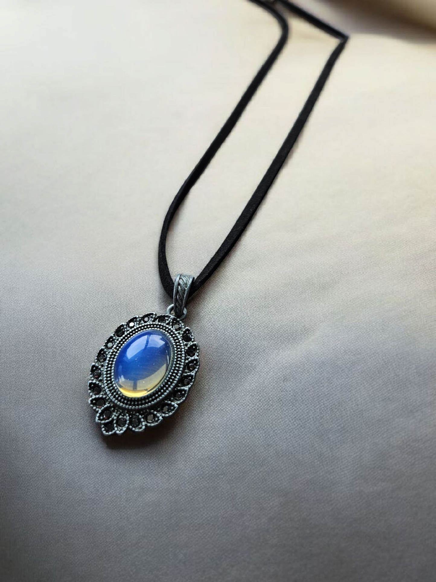 Moonstone Shimmer Pendant on Black Leather Necklace