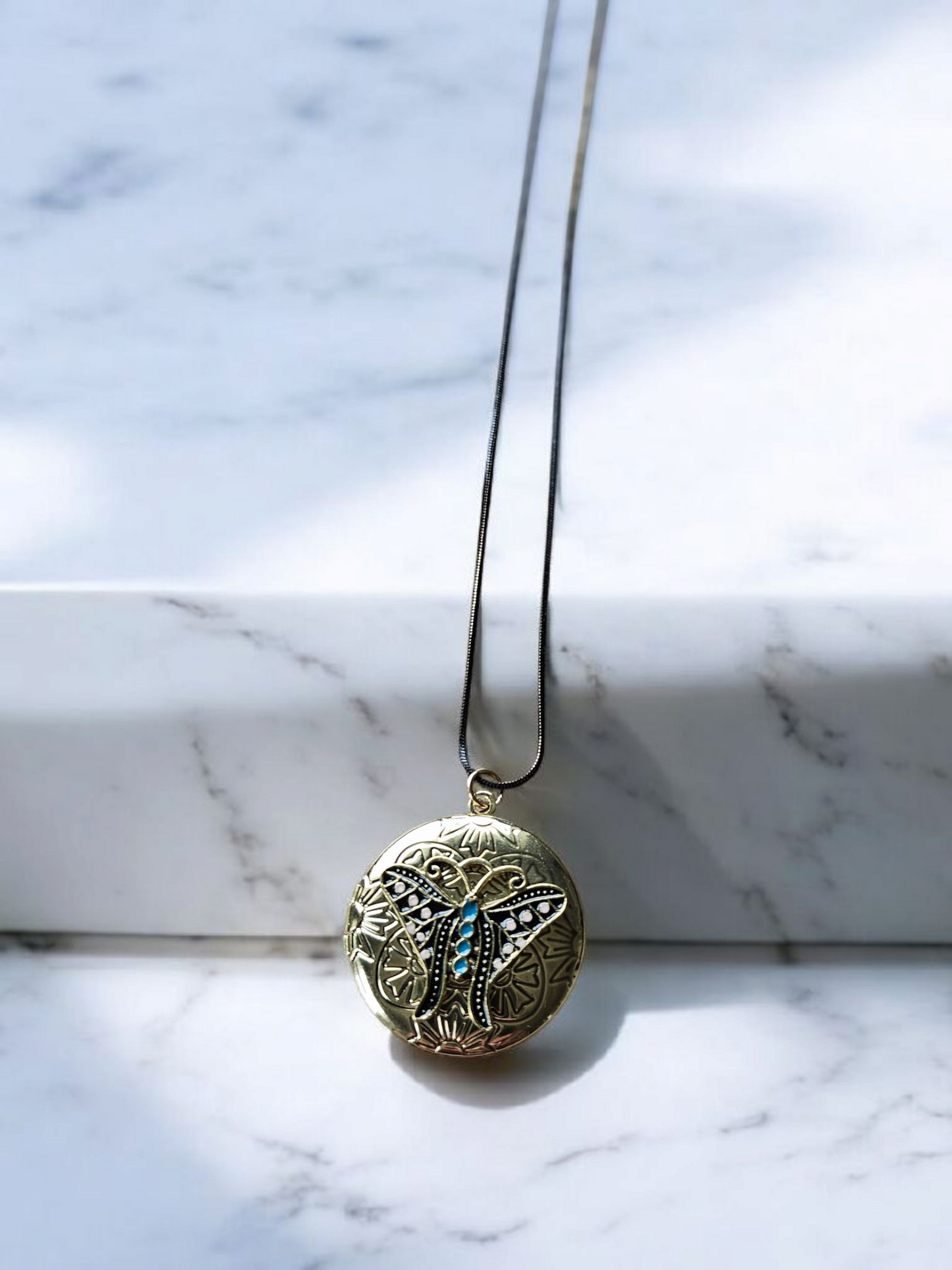 Gold and Teal Moth Locket on Long Black and Gold Shimmer Chain