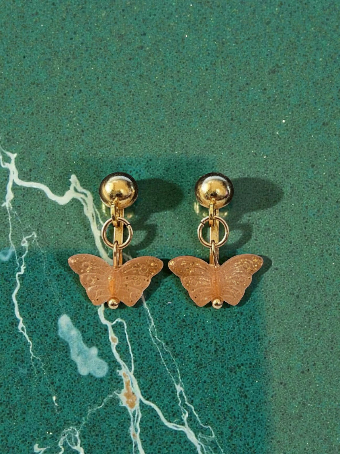 Orange Sparkle Butterfly Clip on Dangle Earrings on Gold Clips