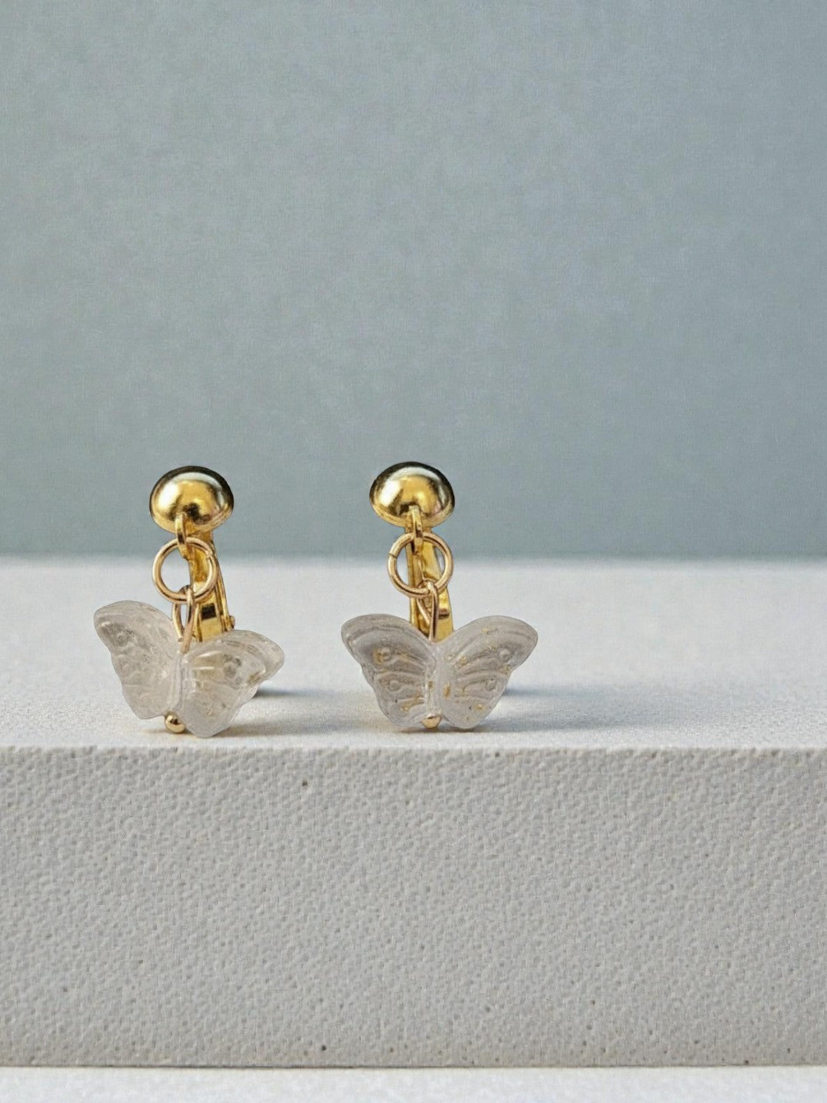 Light Blue Sparkle Butterfly Clip on Dangle Earrings on Gold Clips