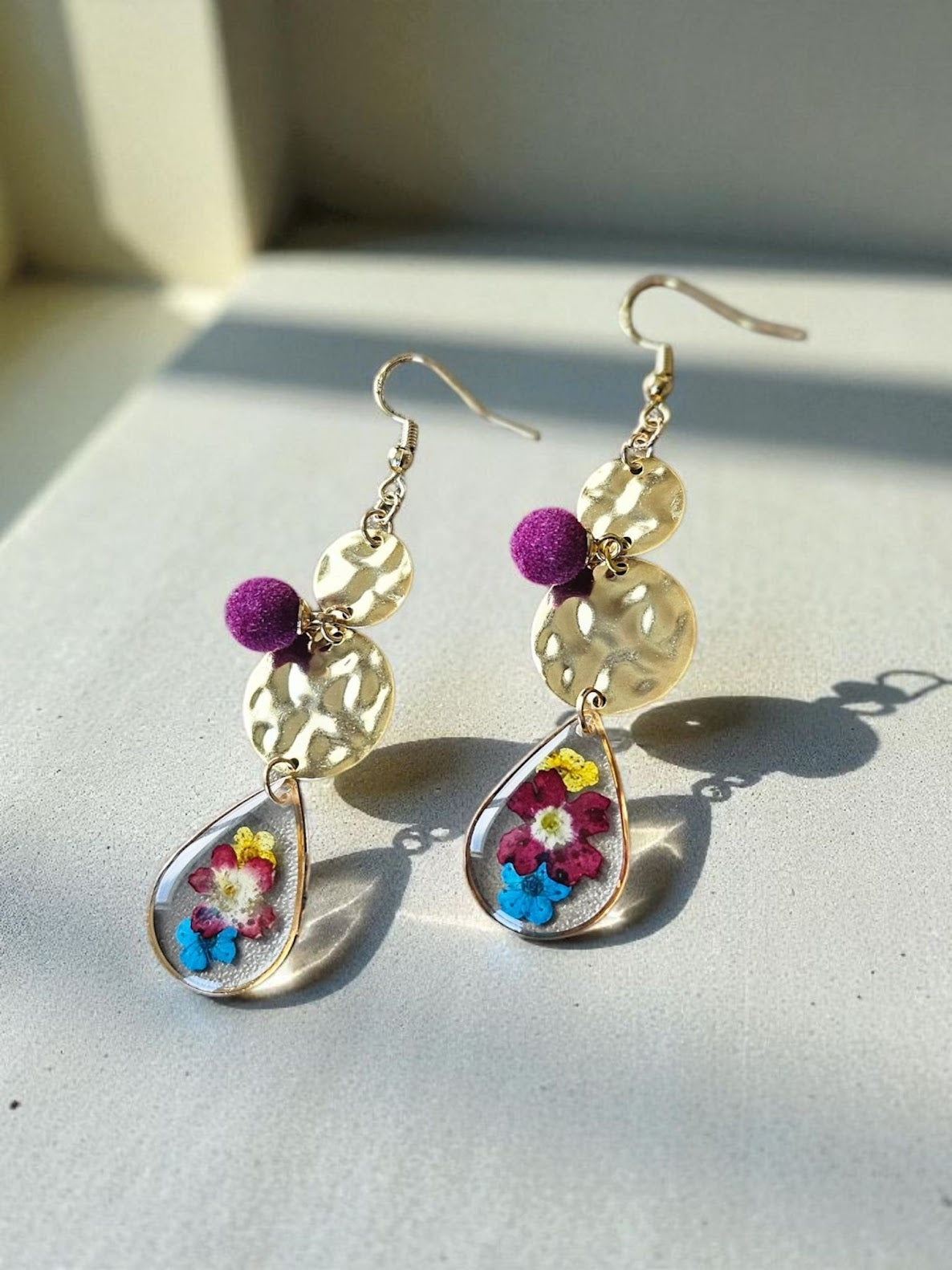 Beautiful Yellow, Purple, and Blue Pressed Flowers in Teardrop on Golden Hammered Circles with Purple Velvet Accent Charm Dangle Earrings