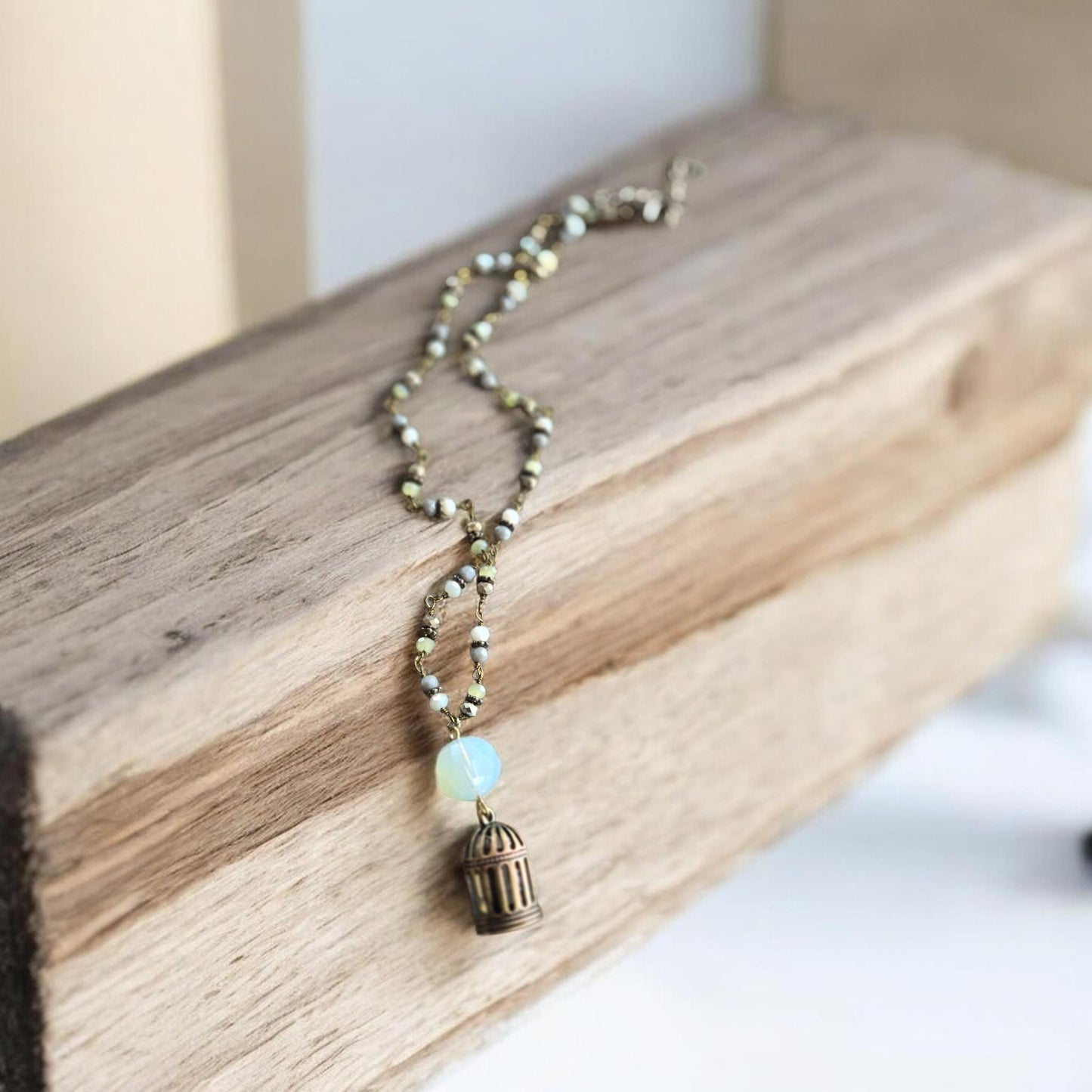 Bronze Bird Cage on Colorful Beaded and Bronze Necklace Chain