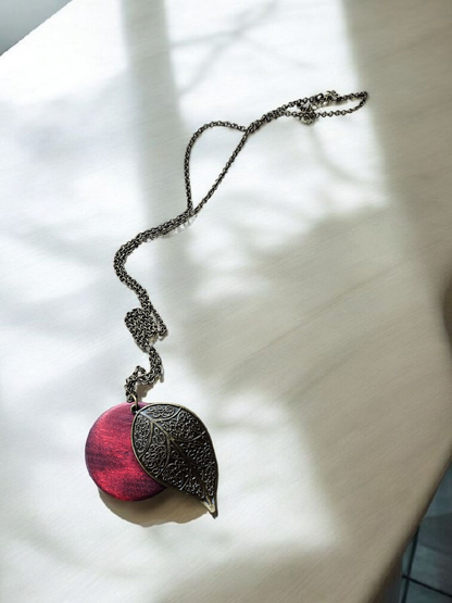 Bronze Leaf and Burgundy Wooden Circle on Long Bronze Necklace
