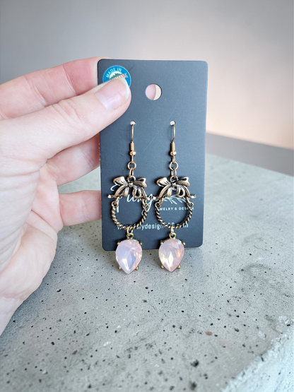 Baby Pink Gems on Golden Bow Knockers Dangle Earrings
