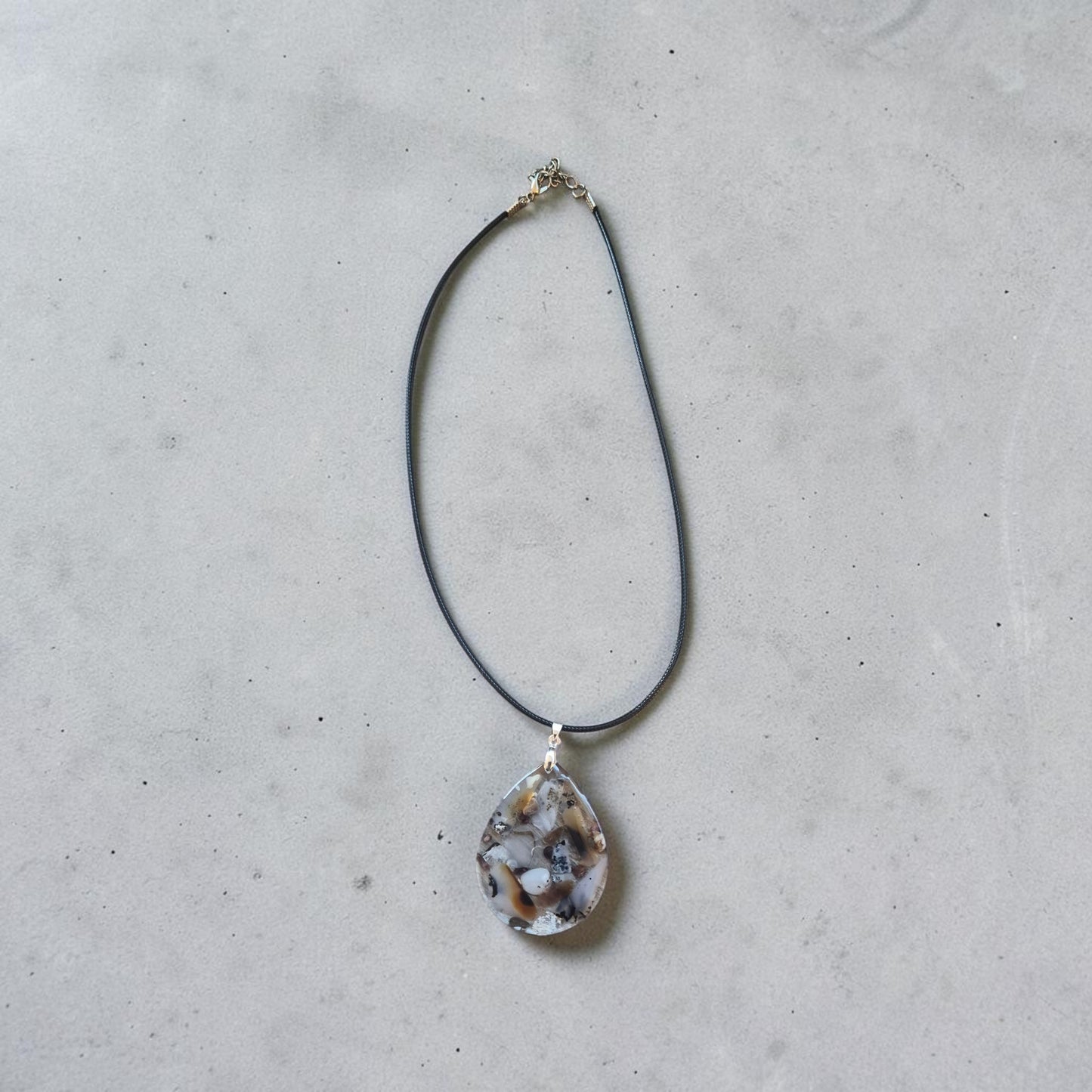 Tumbled Montana Moss Agate in Teardrop Resin Pendant on Black Leather Necklace