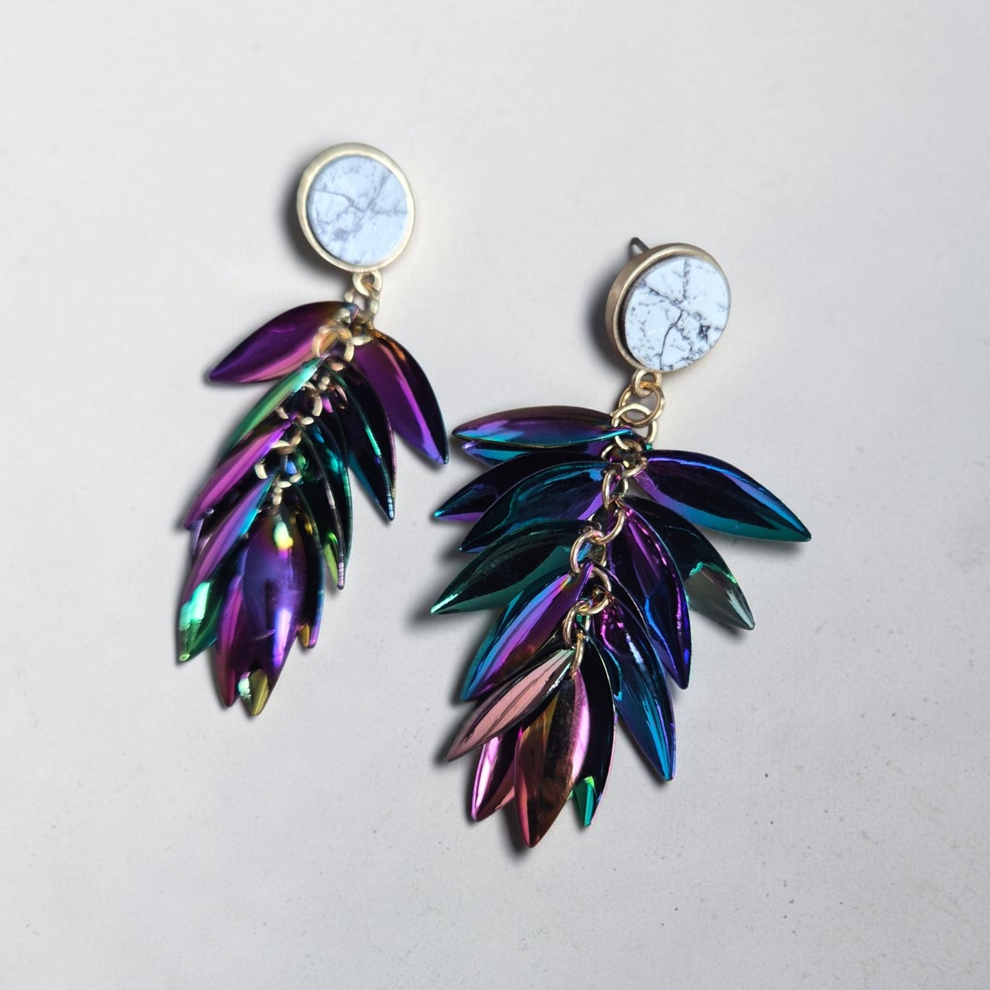 Iridescent Feather Cascade on Marbled Stud Earrings
