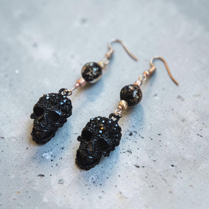 Blingy Black Skulls on Rose Gold Dangle Earrings