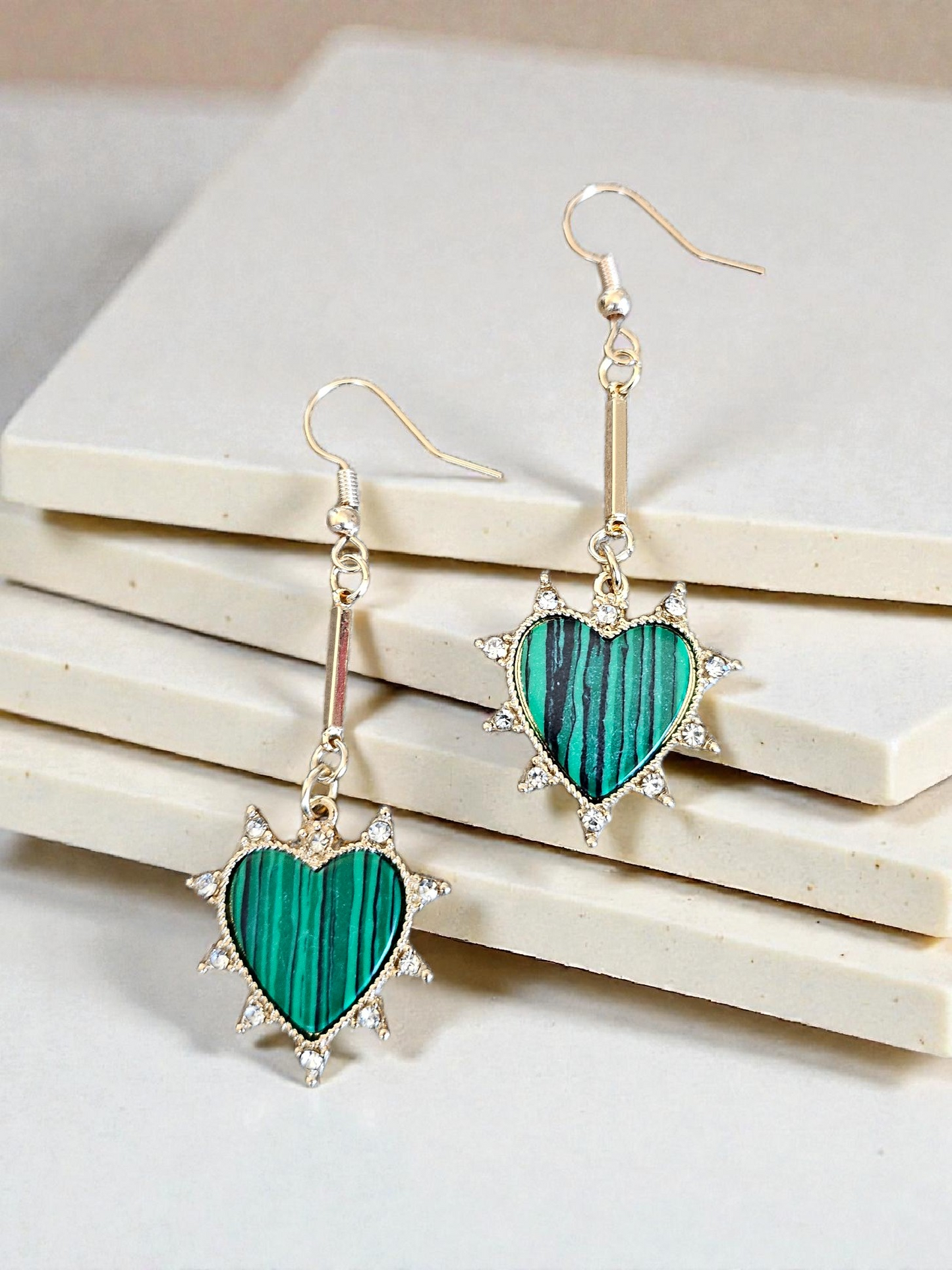Shimmering Emerald Hearts on Golden Bars Dangle Earrings
