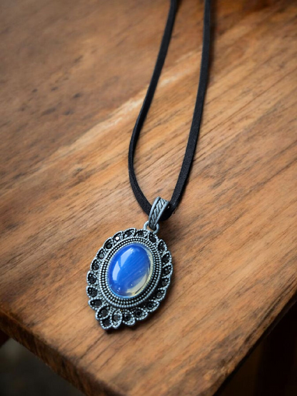 Moonstone Shimmer Pendant on Black Leather Necklace