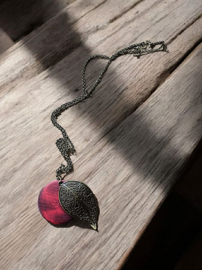Bronze Leaf and Burgundy Wooden Circle on Long Bronze Necklace